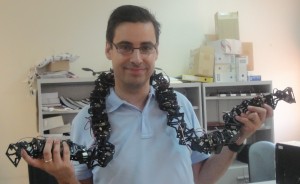 Juan Gonzalez Gomez and a long snake robot